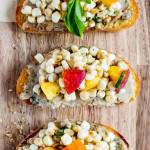 Corn + Peach Crostini with White Bean Basil Puree