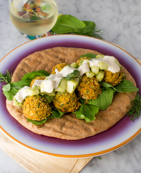 Sweet Potato Falafel Sandwich with cucumber avocado salad and lemon tahini sauce