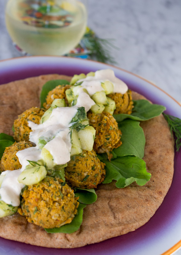 Sweet Potato Falafel Sandwich with cucumber avocado salad and lemon tahini sauce