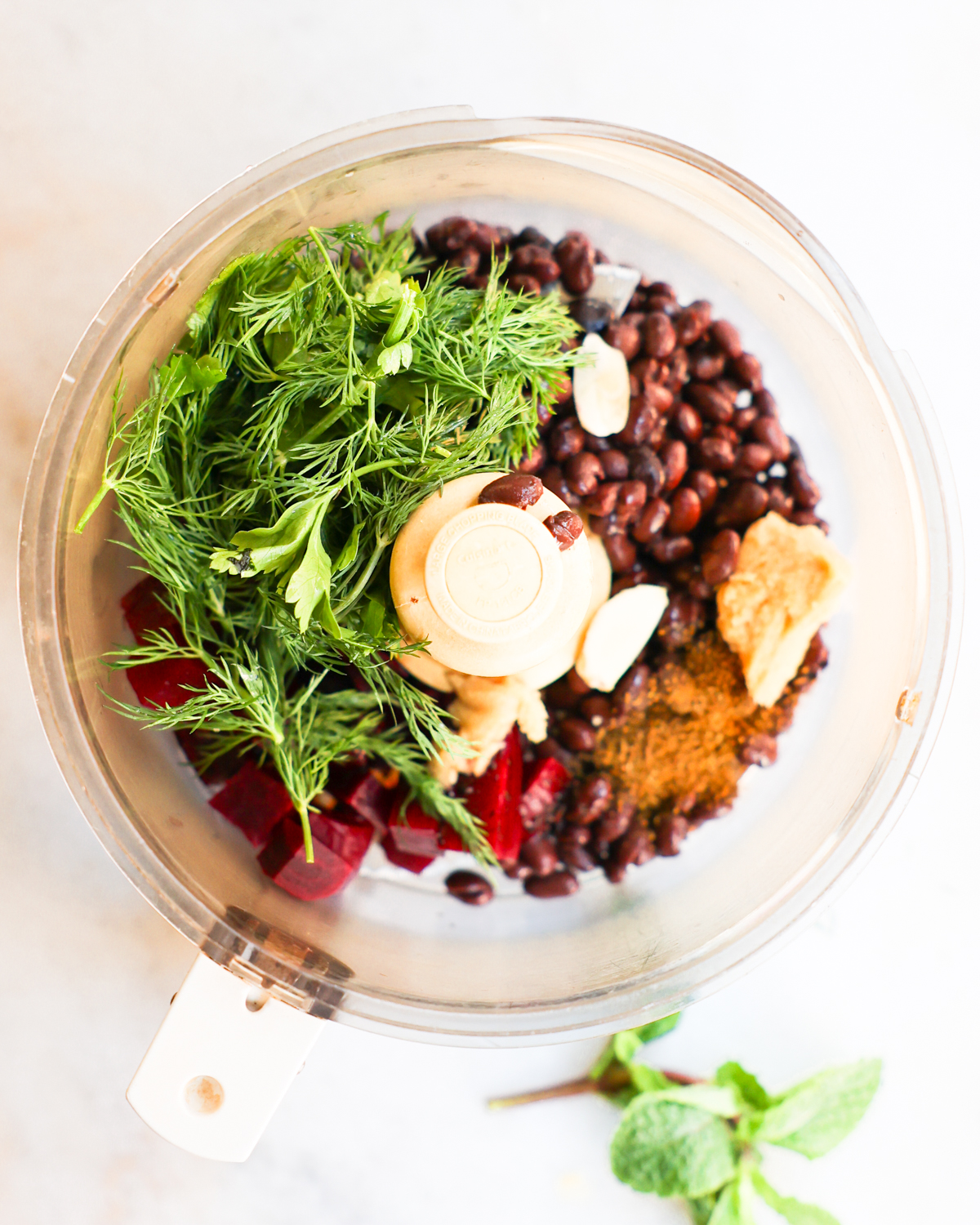 Ingredients for beet dip in a food processor.
