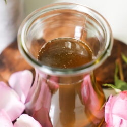 homemade closeup of Rose simple syrup in a jar