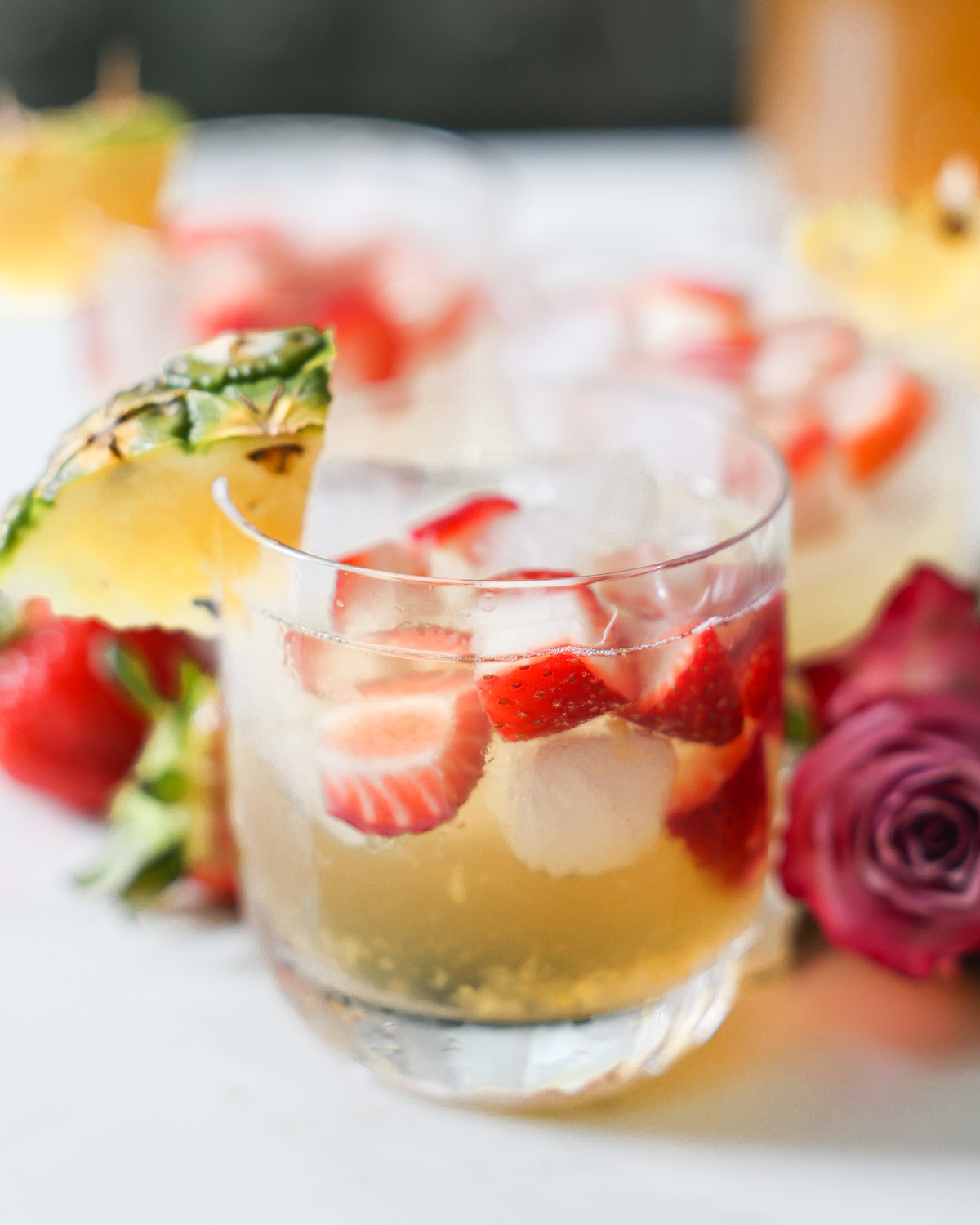 Pineapple white sangria in a glass.