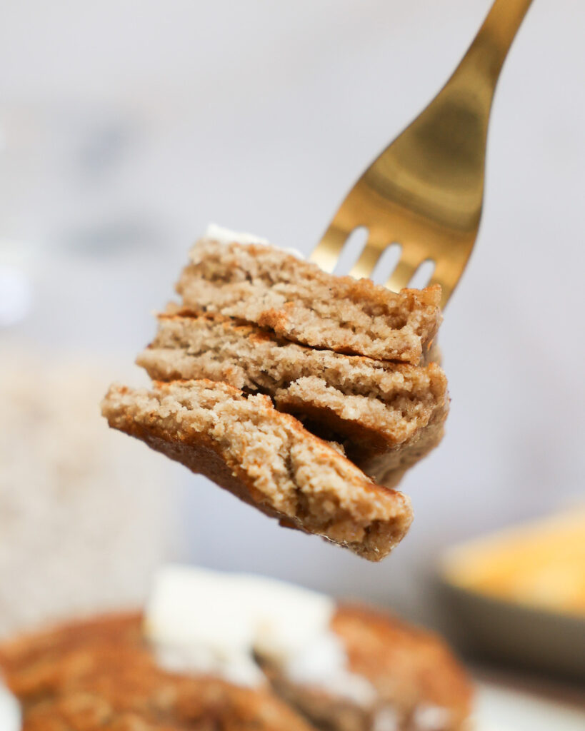 side view of oat flour pancakes on a fork