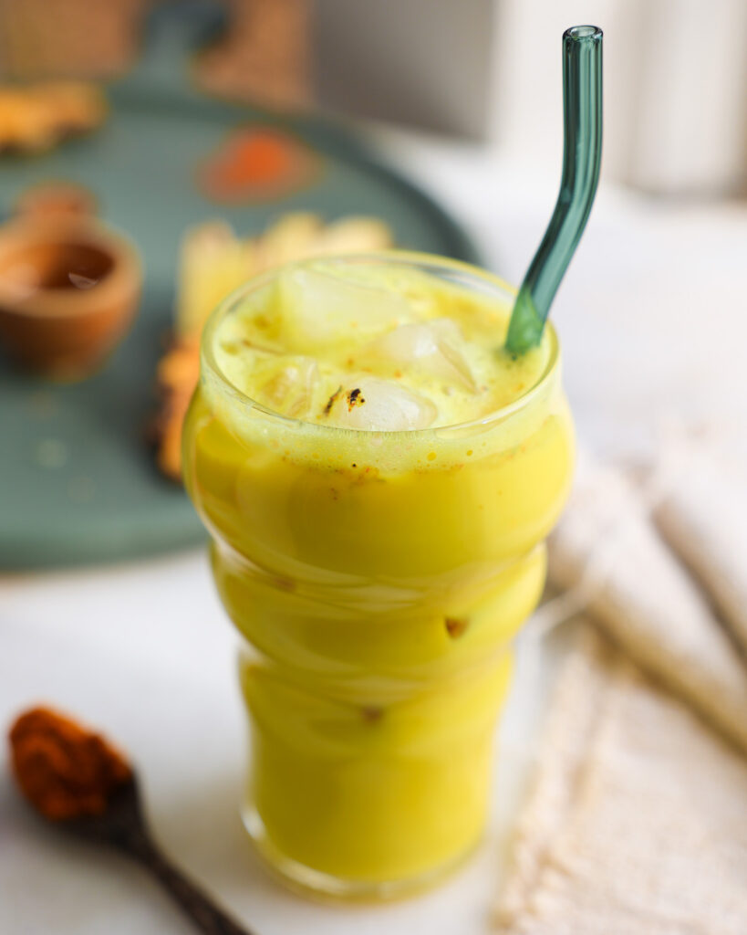 iced turmeric latte in a tall glass