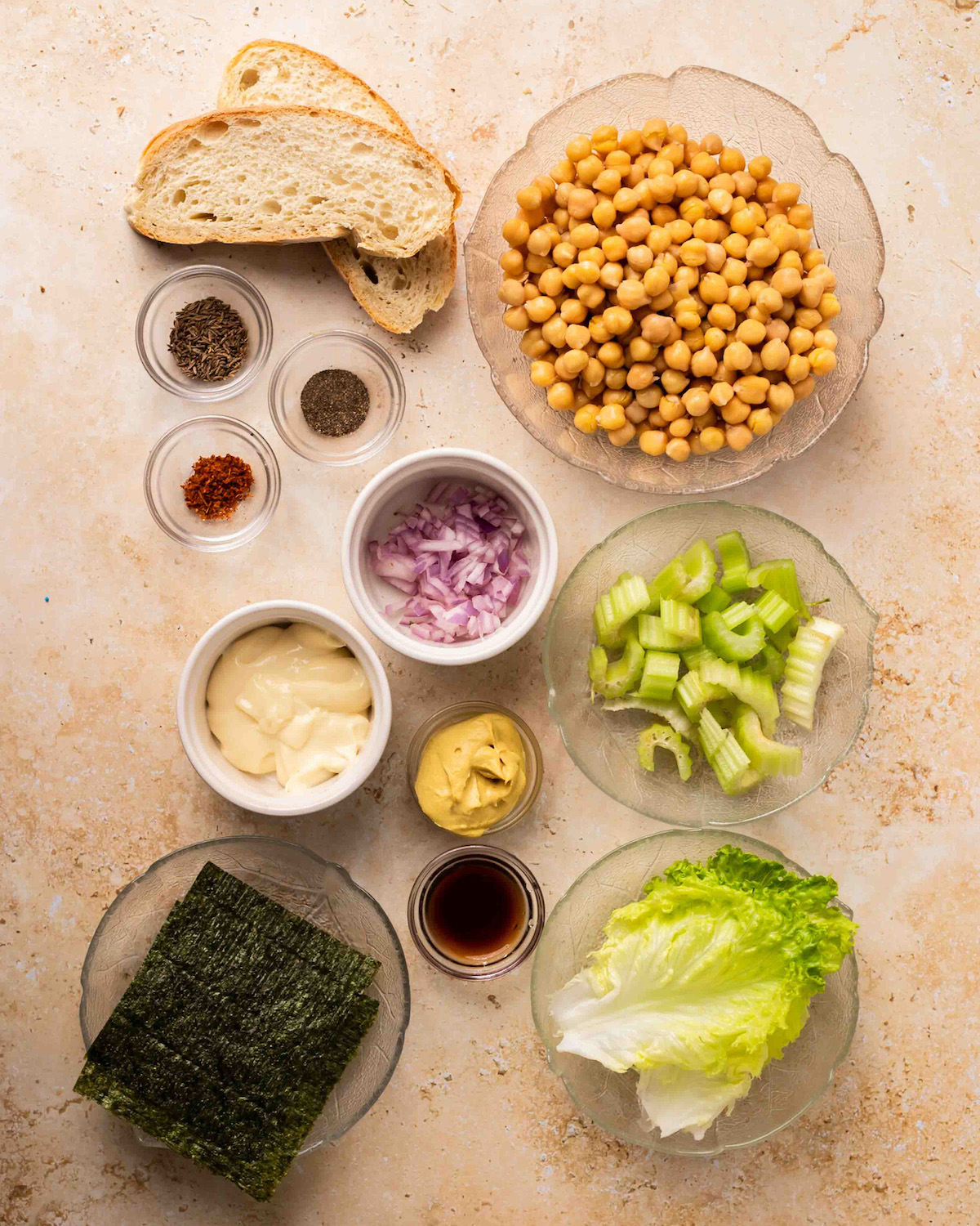 All of the ingredients for chickpea tuna salad on the counter.