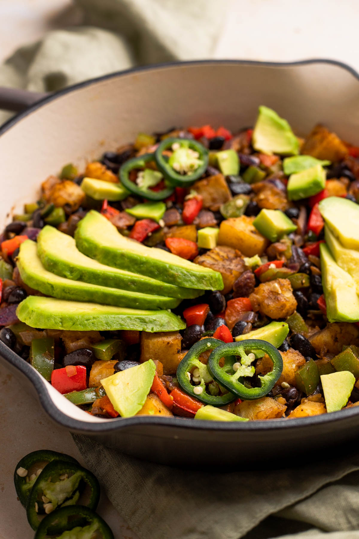 side view of sweet potato breakfast hash in skillet