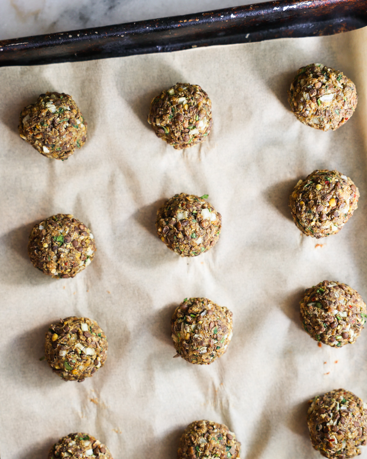 overhead of baked vegan meatballs