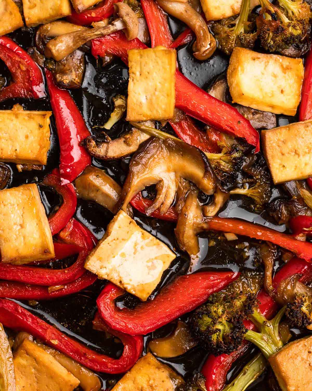 An up-close overhead shot of roasted maple teriyaki tofu & veggies.