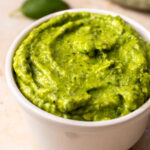 close up of avocado dressing in a bowl