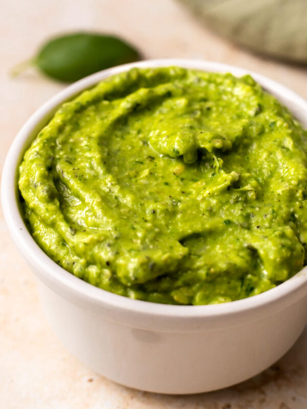 close up of avocado dressing in a bowl