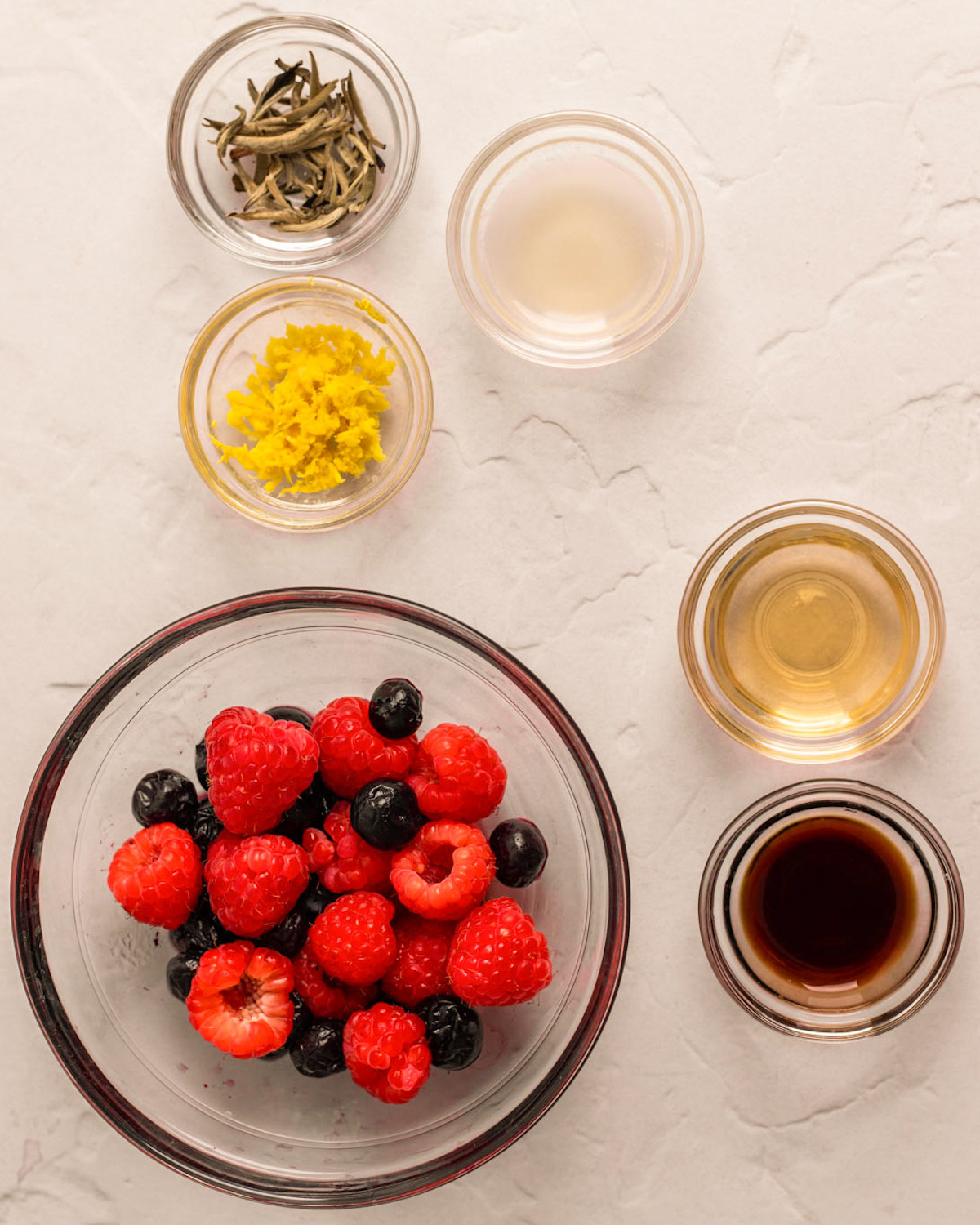 An overhead shot of alternative strawberry soda ingredients.