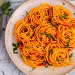 swirls of Gochujang Buttered Noodles on a plate