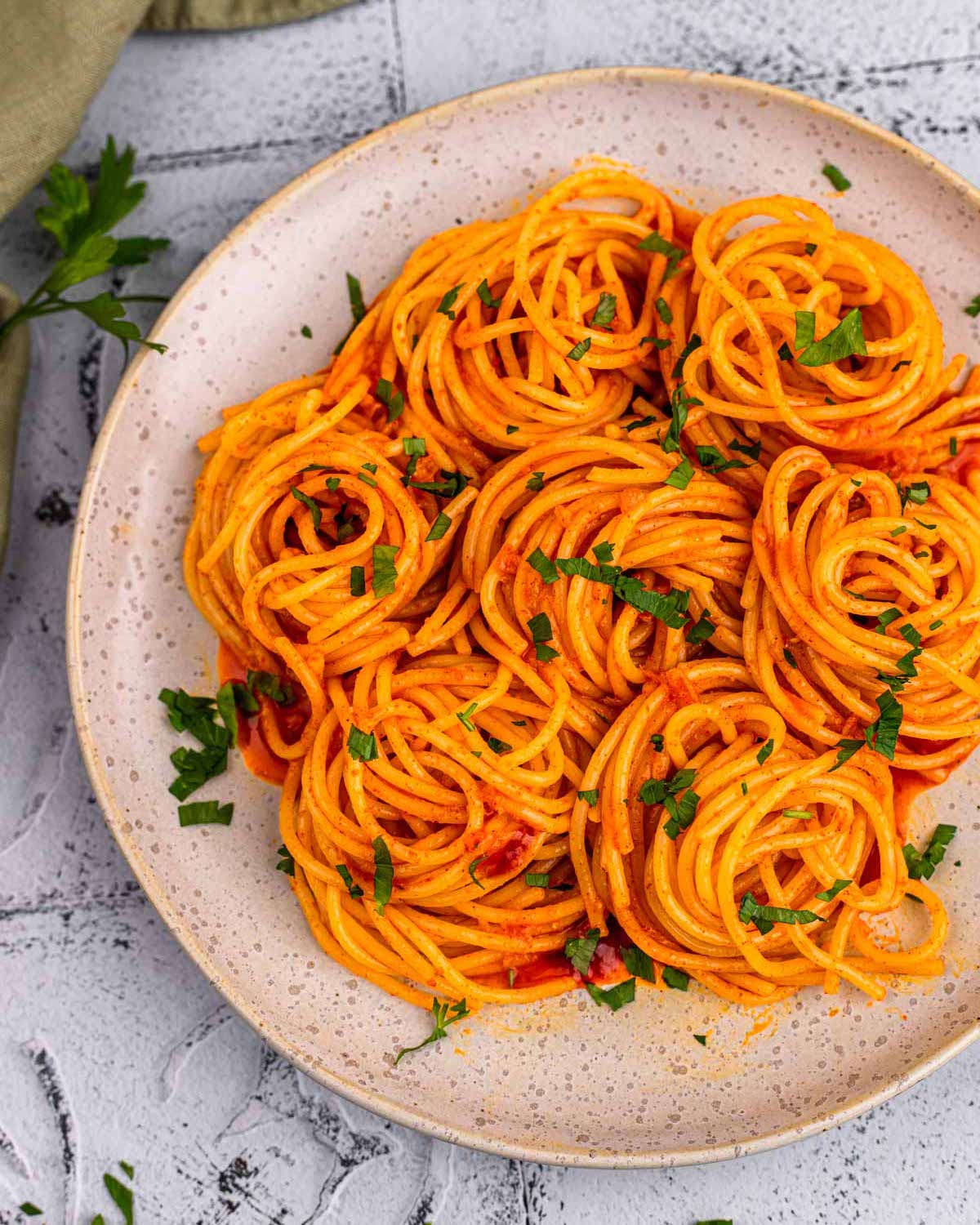 swirls of Gochujang Buttered Noodles on a plate