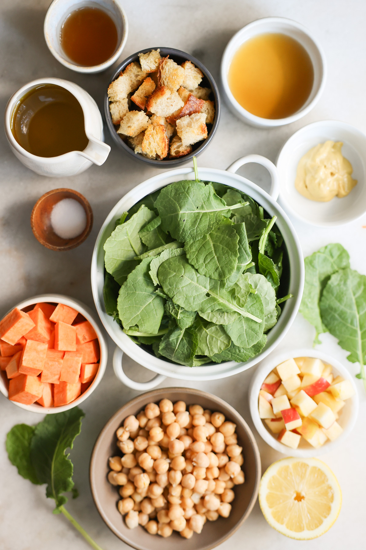 overhead of ingredients for baby kale salad