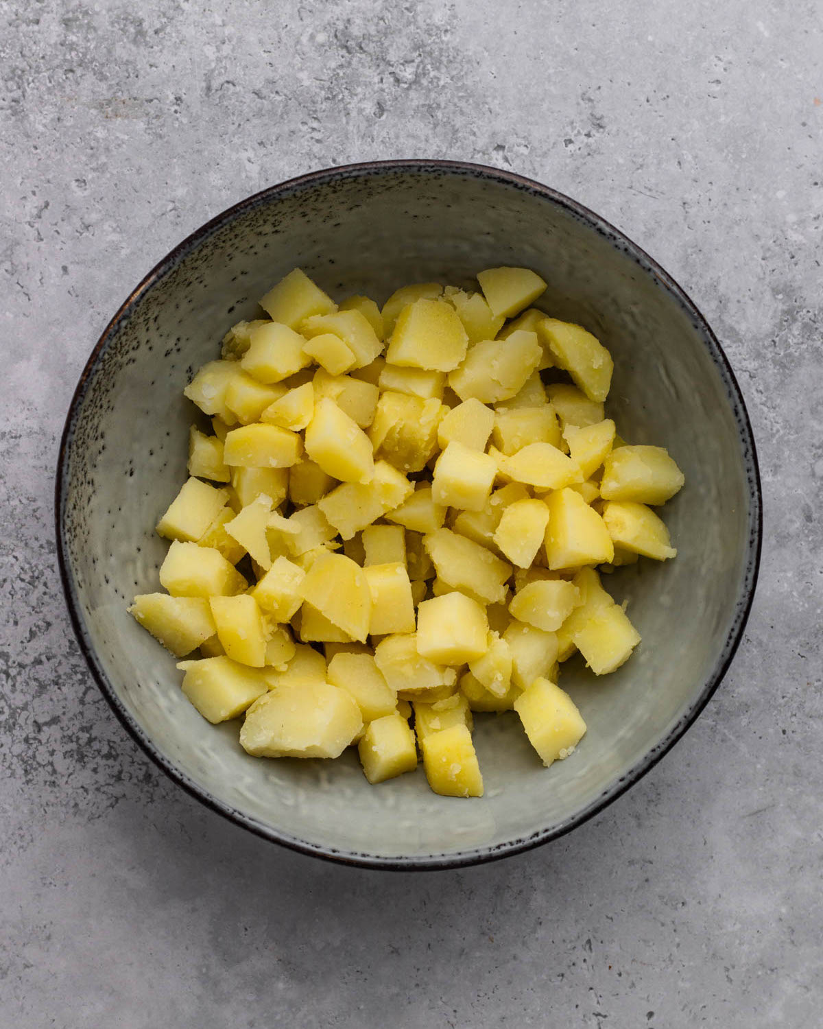 cubed potatoes in a bowl