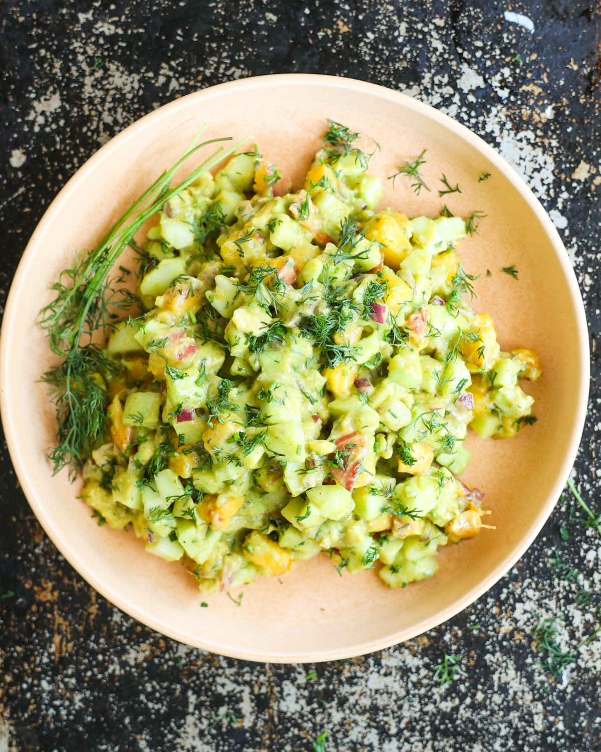 overhead of cucumber avocado salad