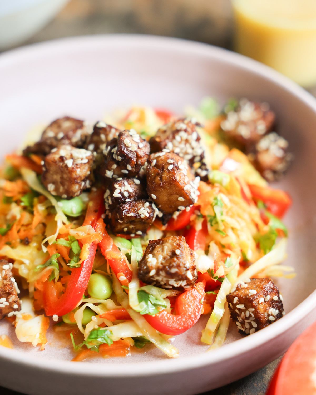 A close up shot of Crunchy Sesame Tofu Salad in a bowl.