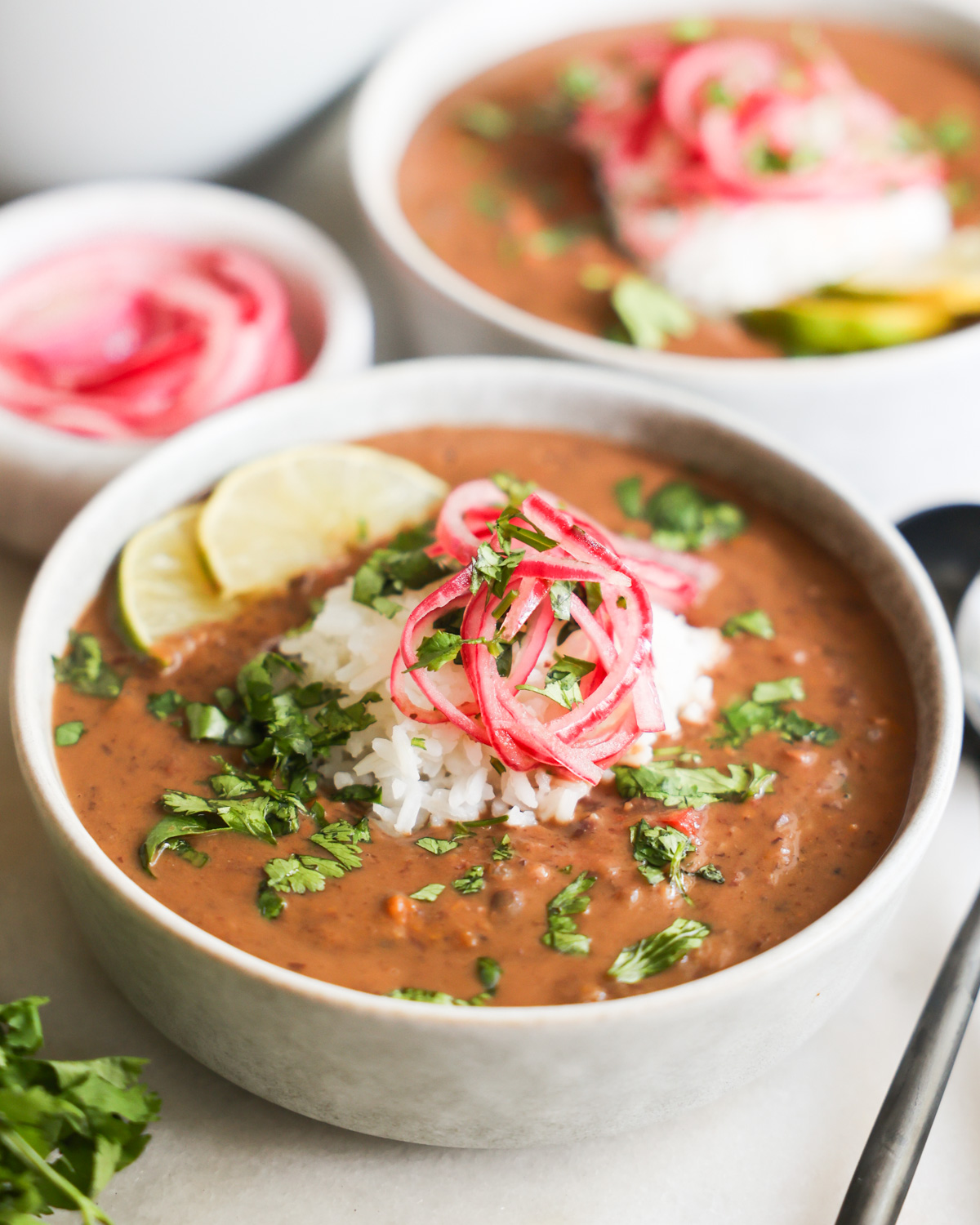 black bean soup topped with colorful garnish