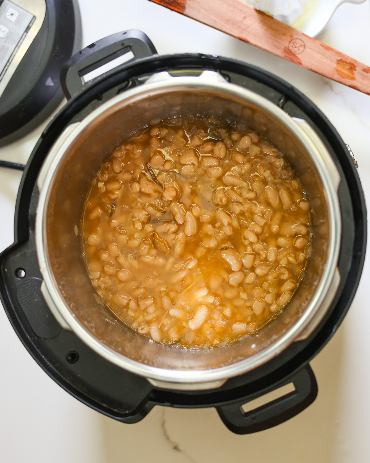 Cooked creamy white beans in the Instant Pot. 