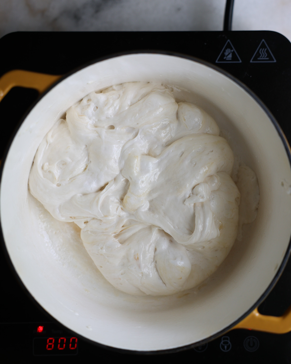 overhead of melted marshmallows in a pot