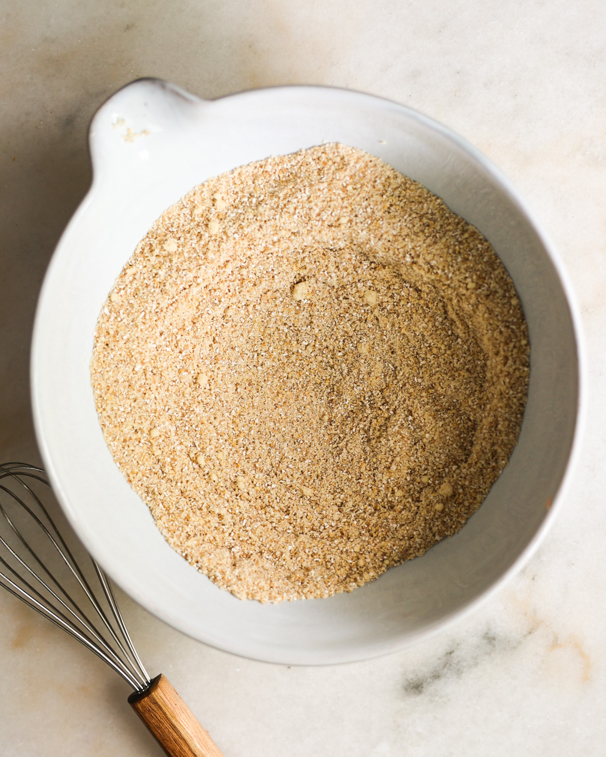 The dry ingredients in a mixing bowl.