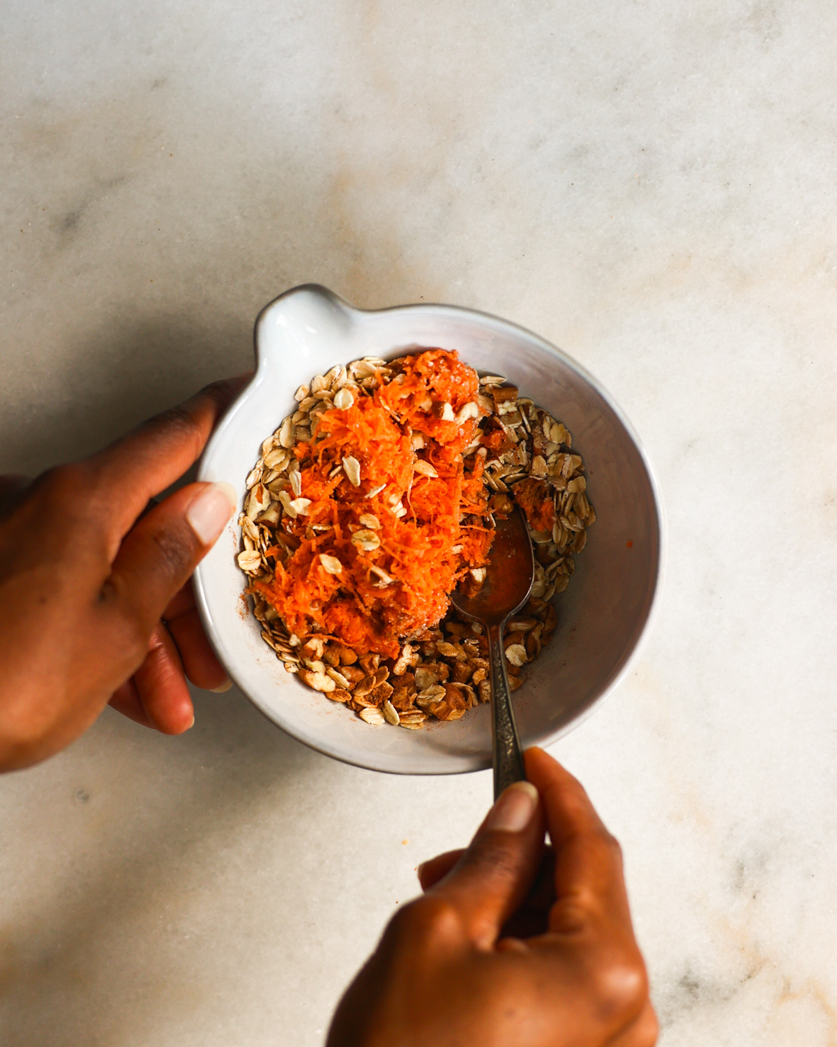 Mixing the sweet potato streusel in a small bowl.