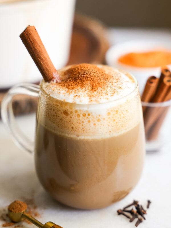 side view of sweet potato latte topped with cinnamon