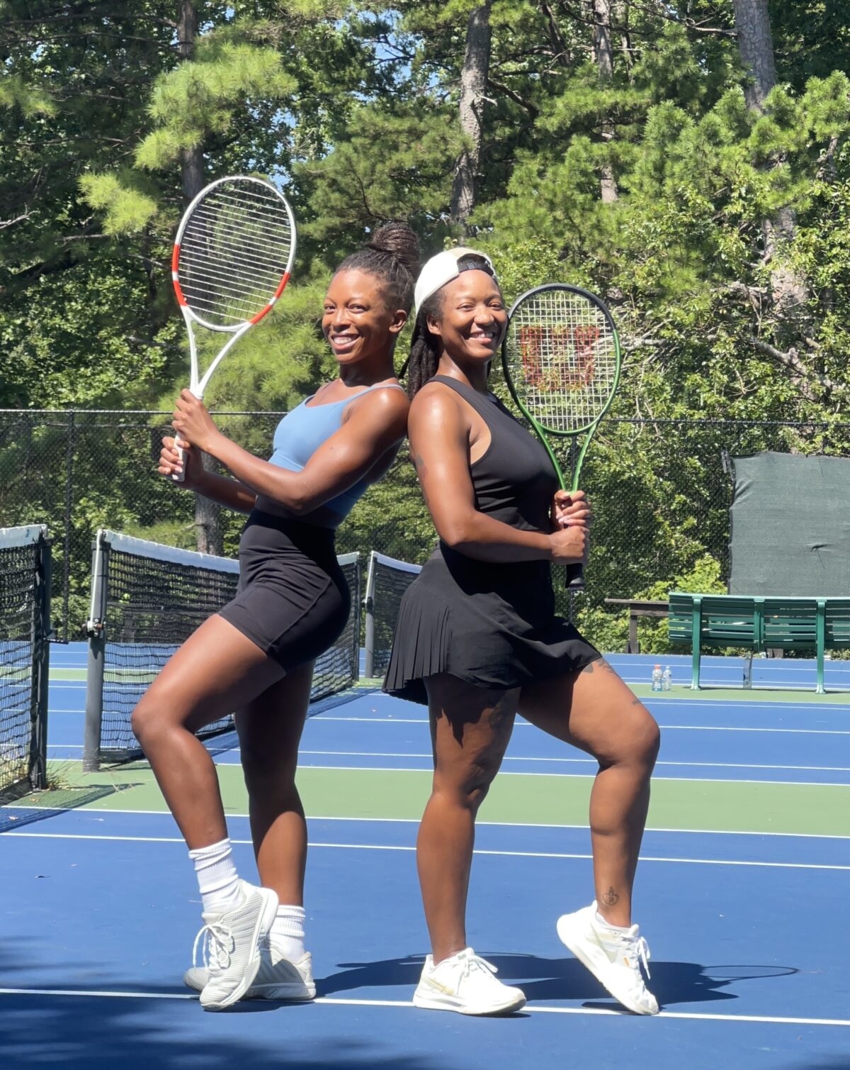 jenné and patty holding tennis rackets