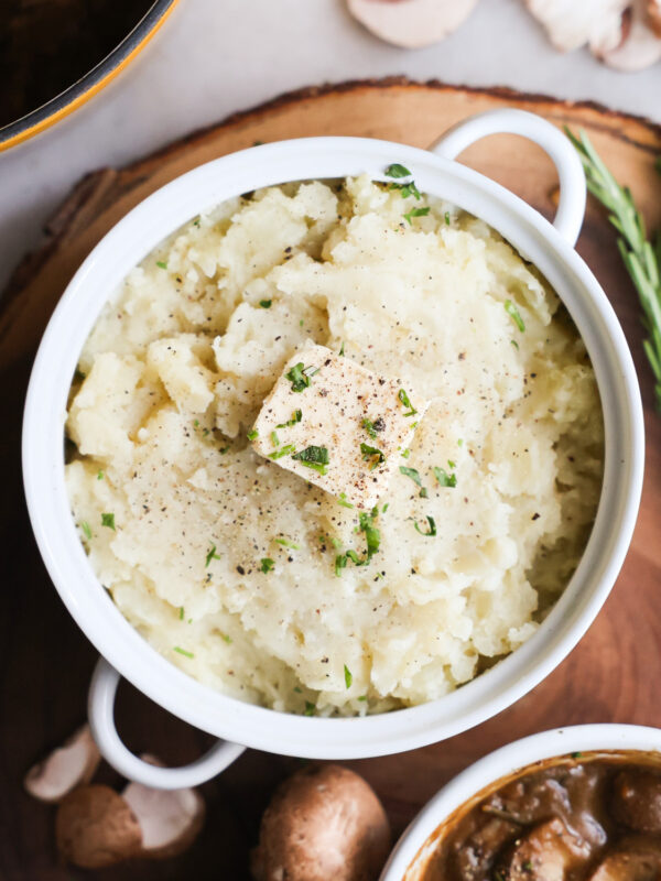 overhead of vegan mashed potatoes with mushroom gravy