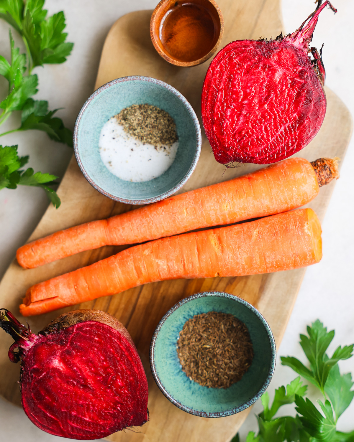 An overhead shot of the ingredients to make roasted beets and carrots.