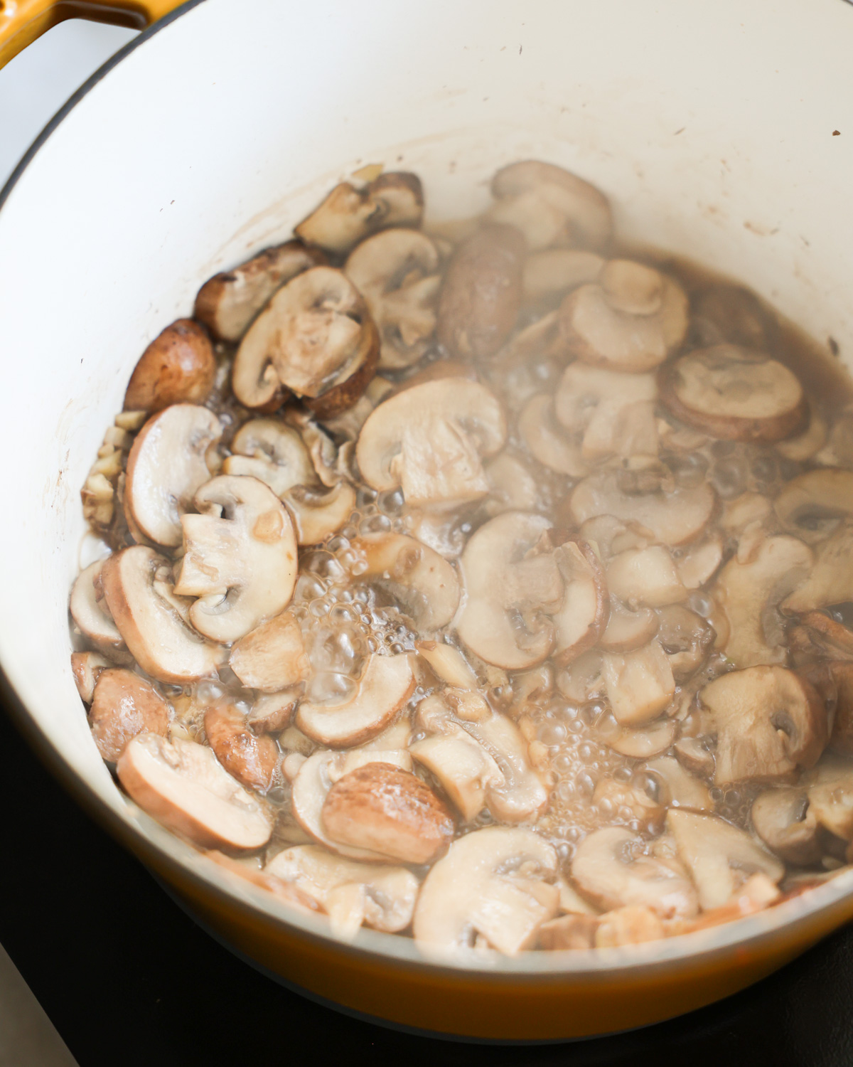 mushroom simmering in pot