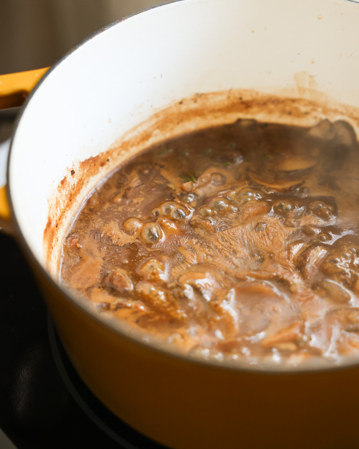 vegan mushroom gravy simmering in pot