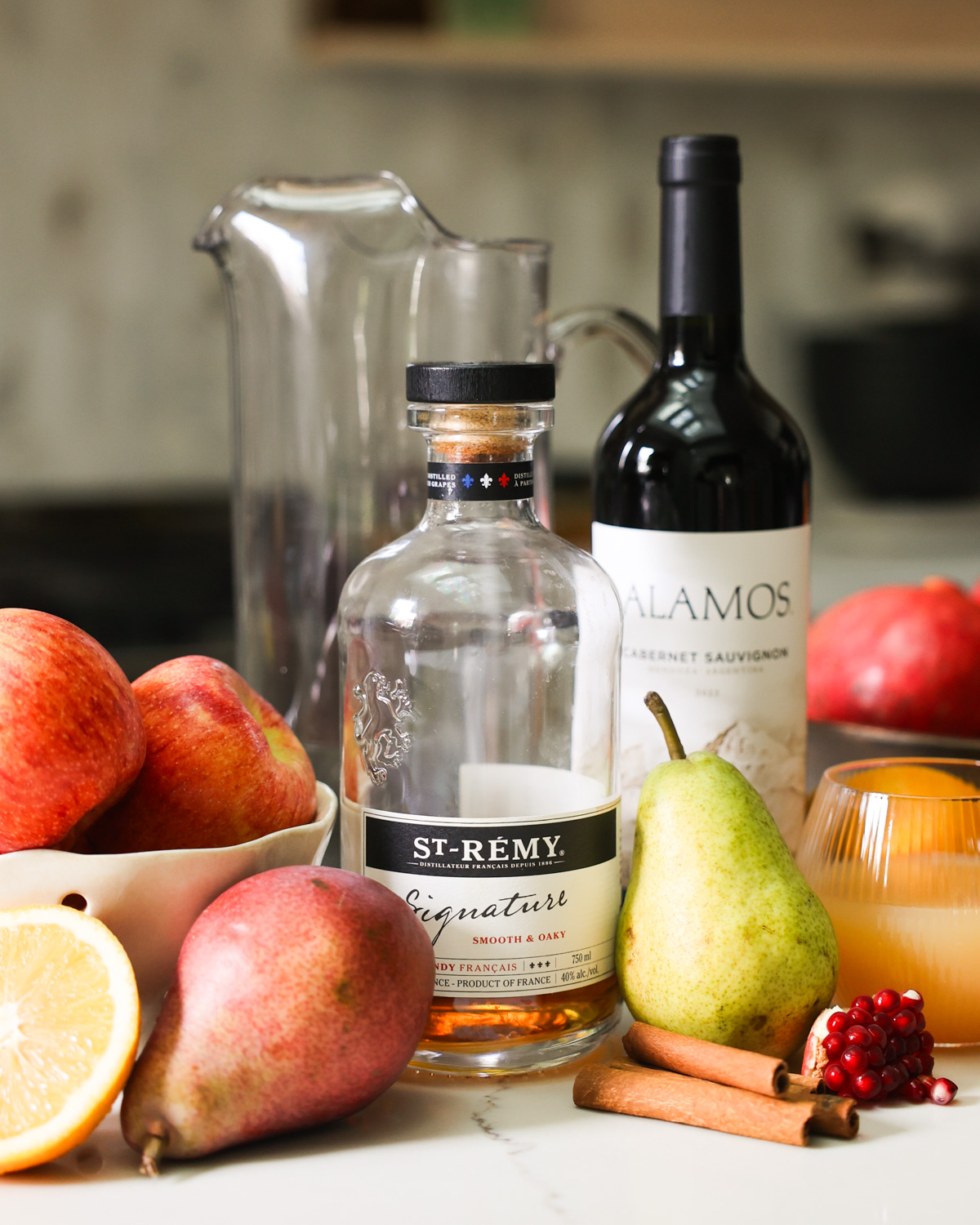 fall sangria ingredients on kitchen counter