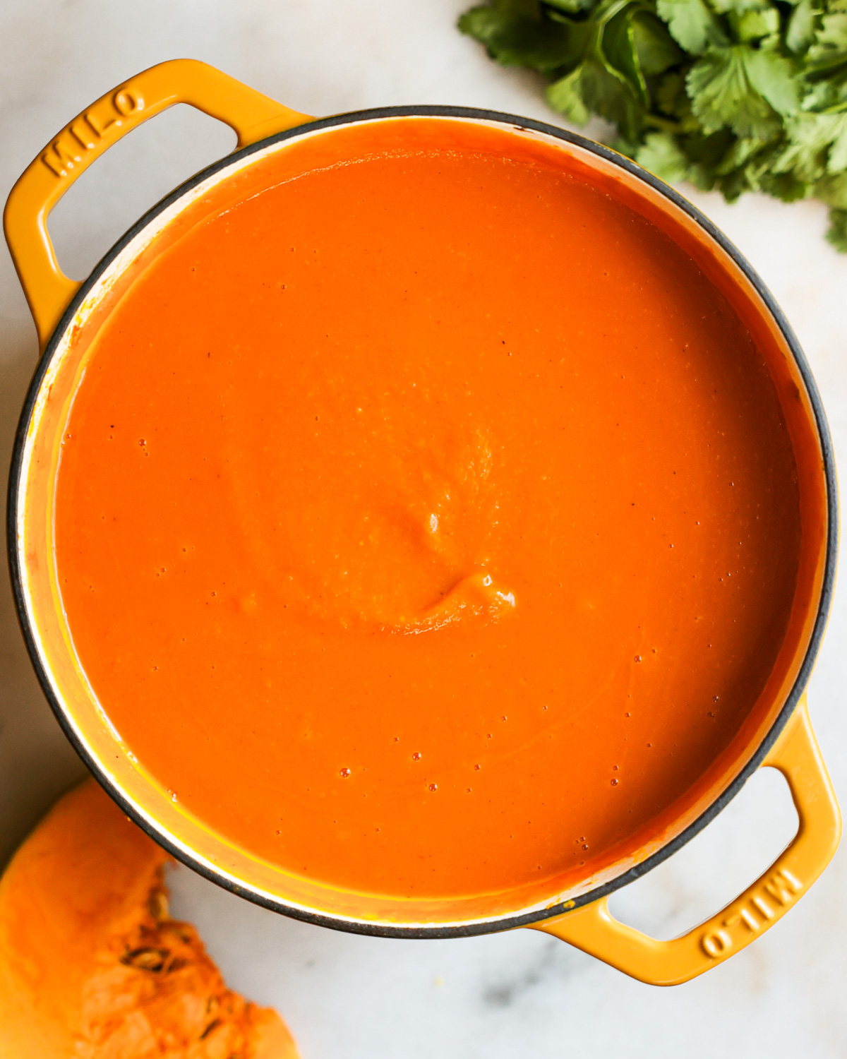 overhead of creamy japanese pumpkin soup