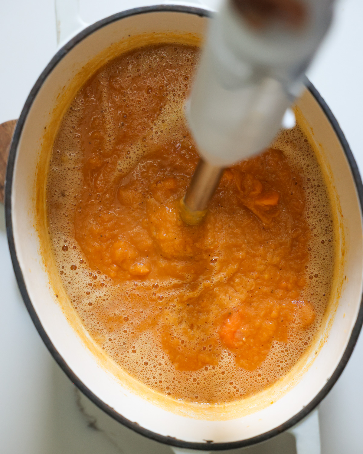 blending sweet potato soup