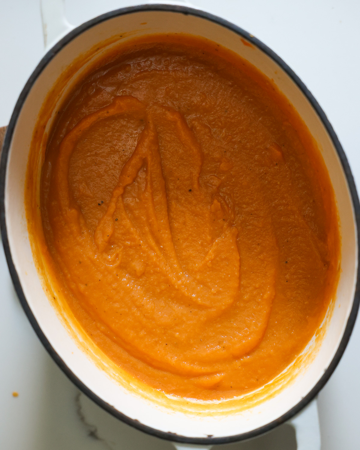 overhead of sweet potato soup in pot