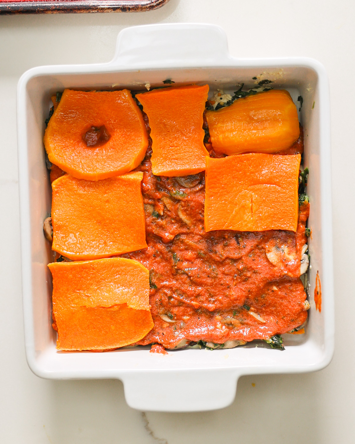 layering butternut squash lasagna 