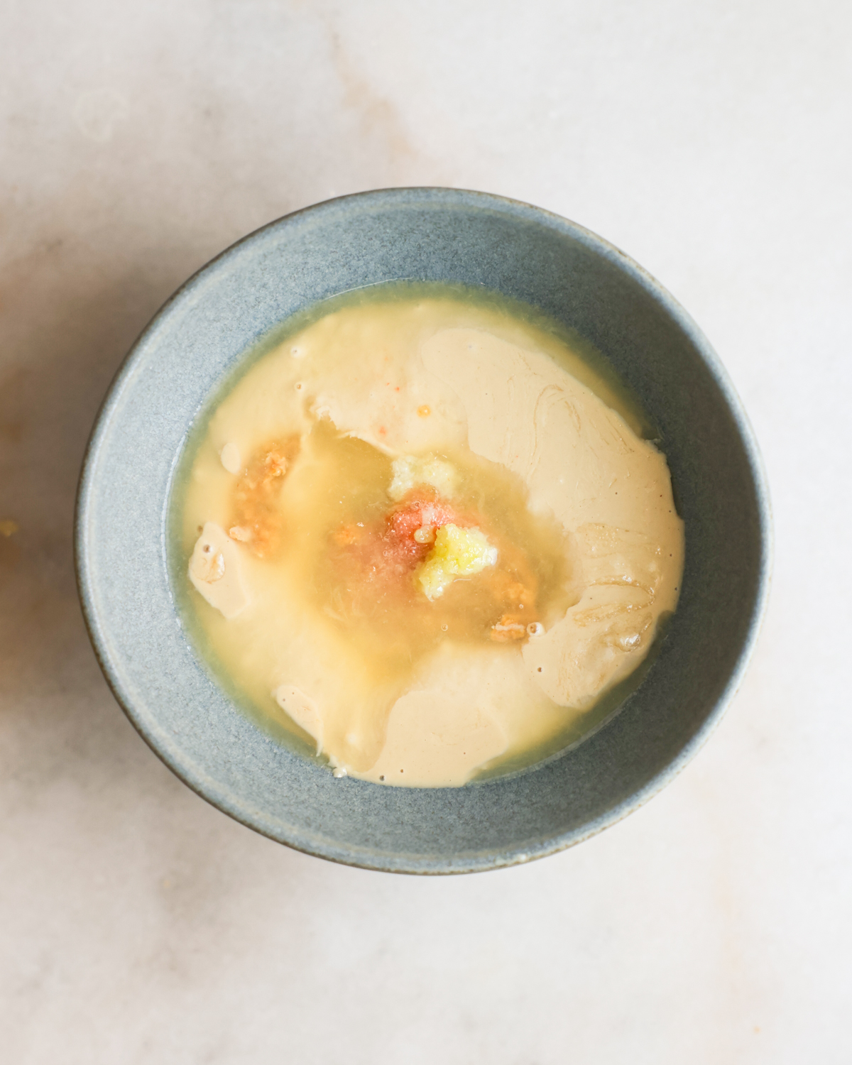 miso tahini dressing ingredients in a bowl