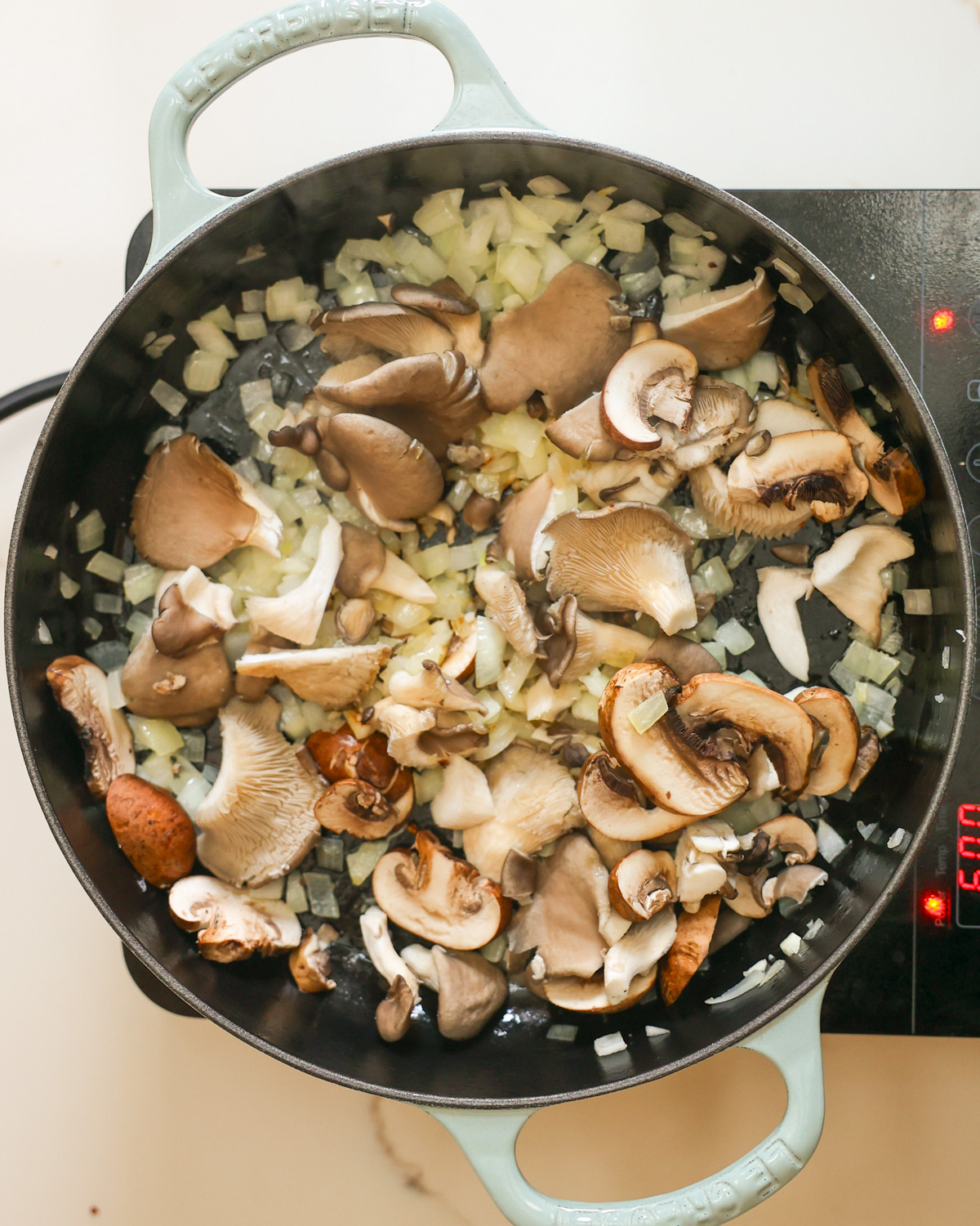 overhead sautéing mushrooms