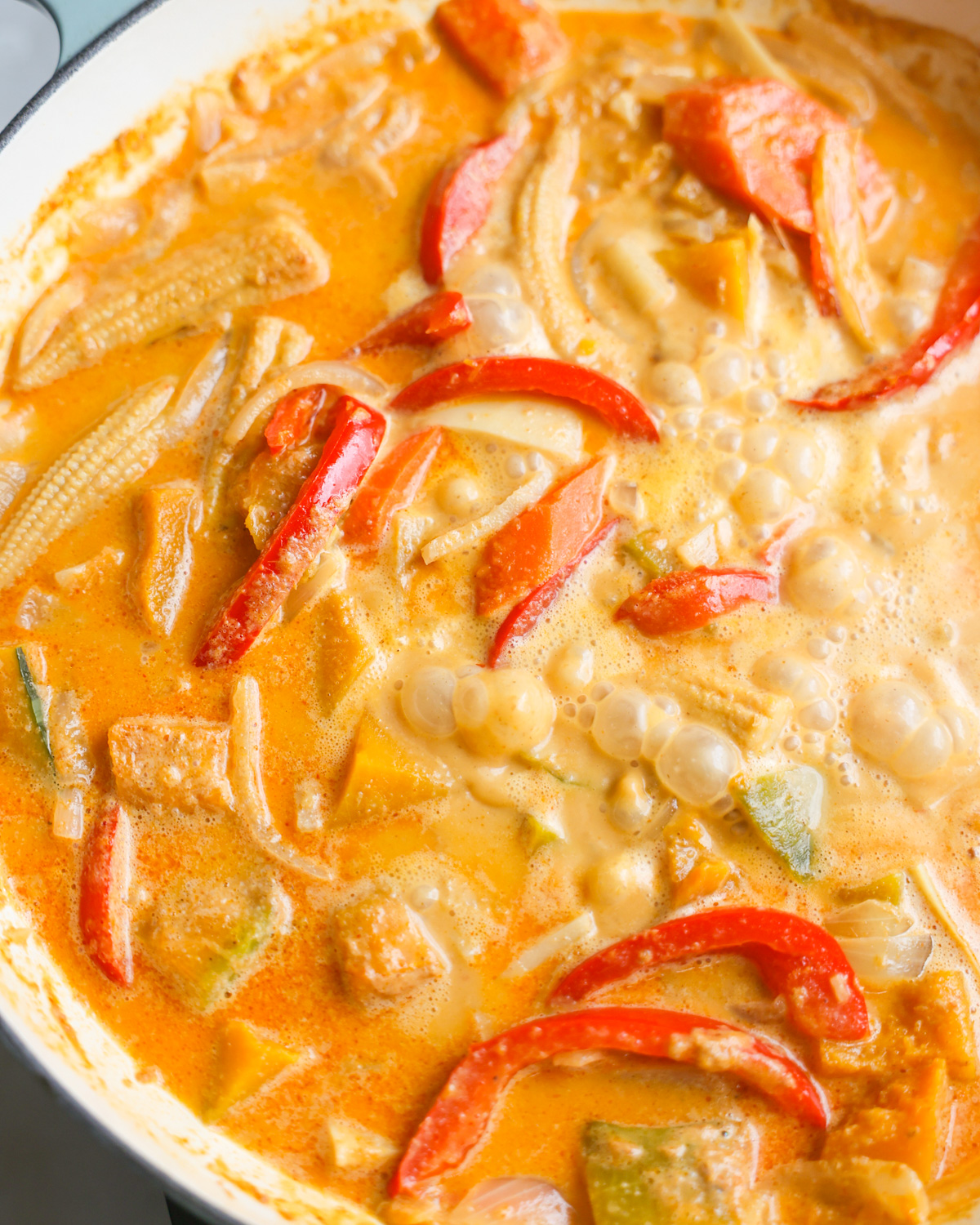 pumpkin curry simmering in pan