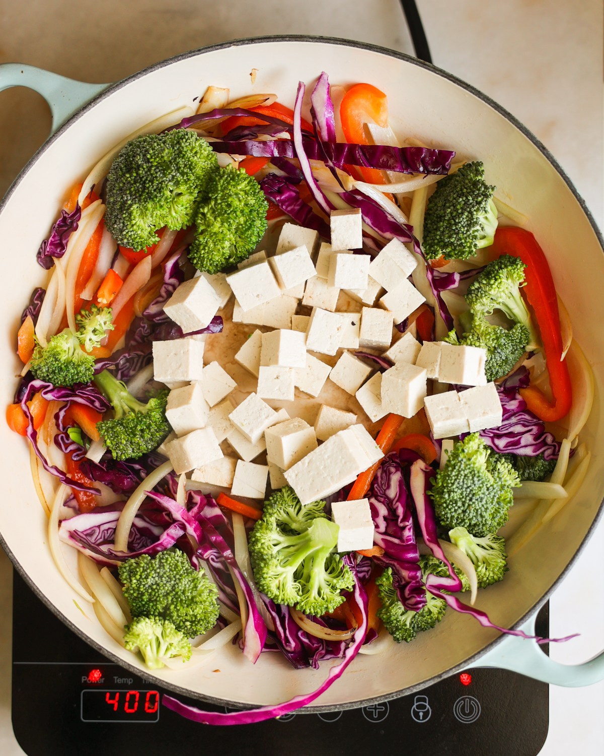 overhead tofu added to pan