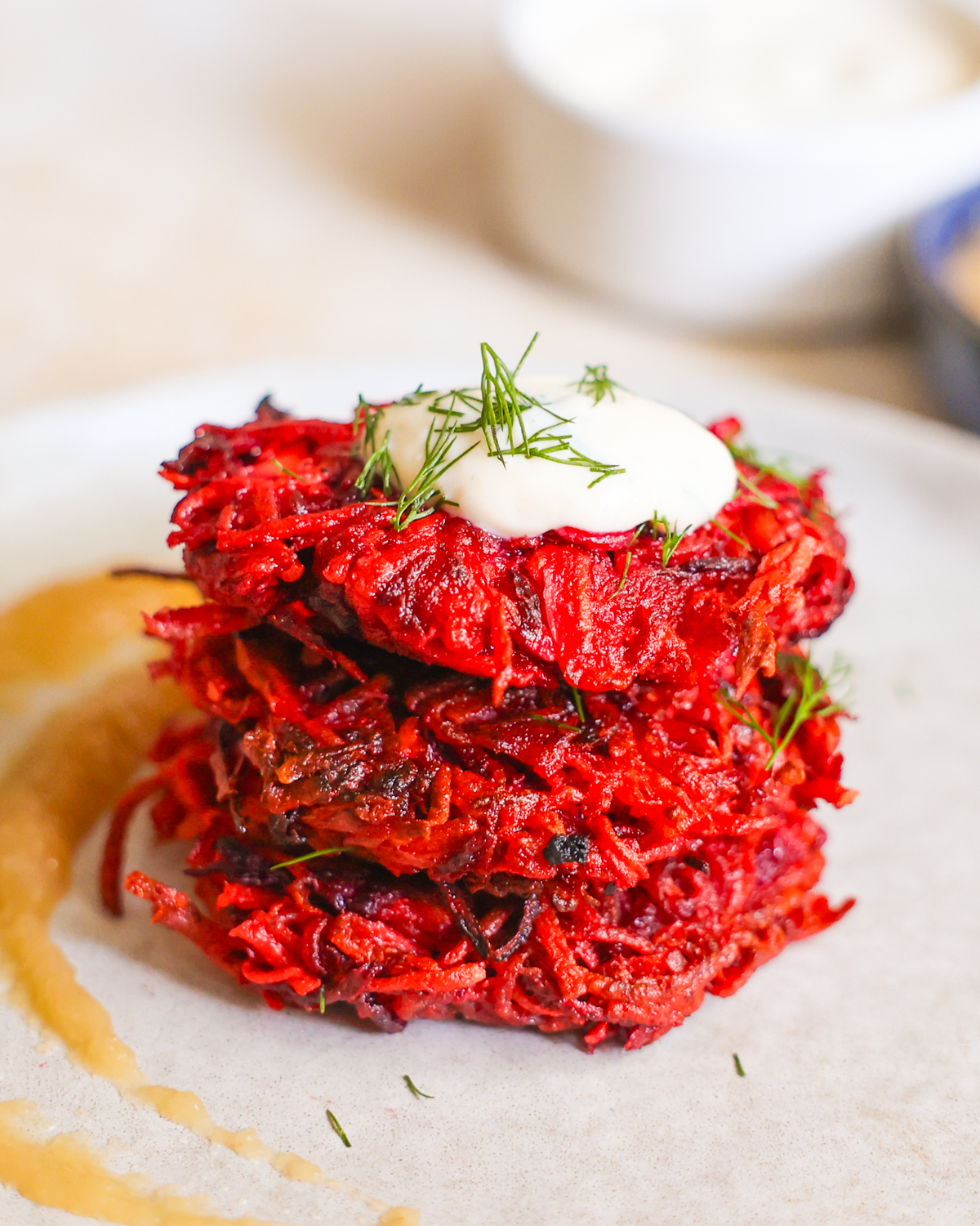 stack of beet and sweet potato fritters