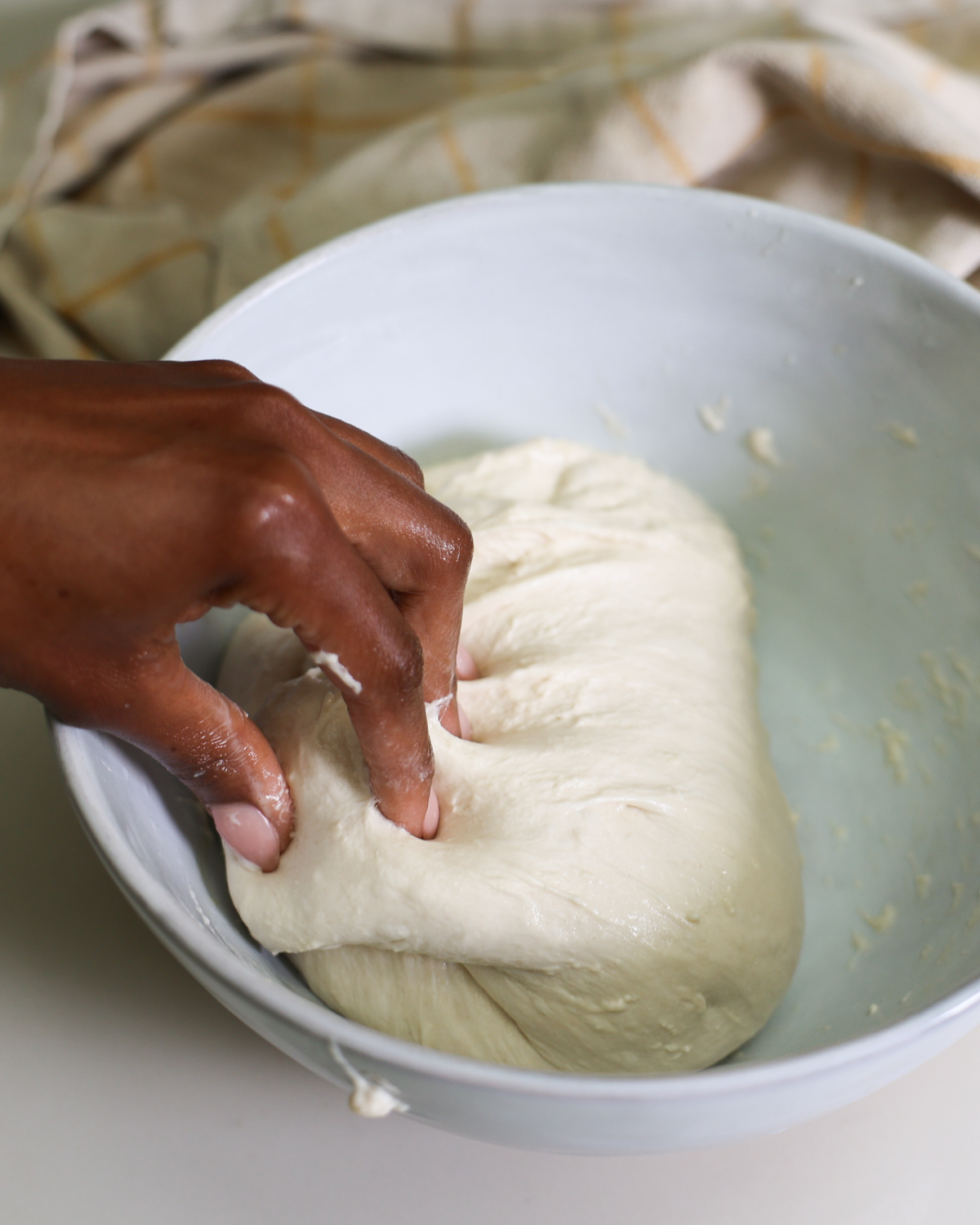 folding pizza dough
