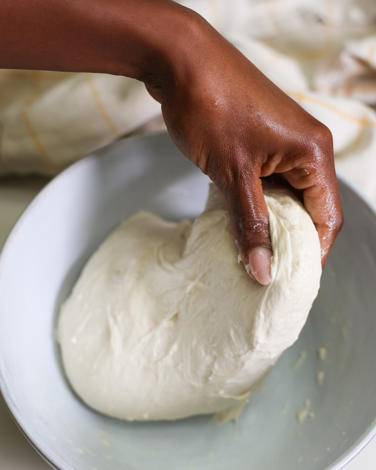 overhead stretching dough