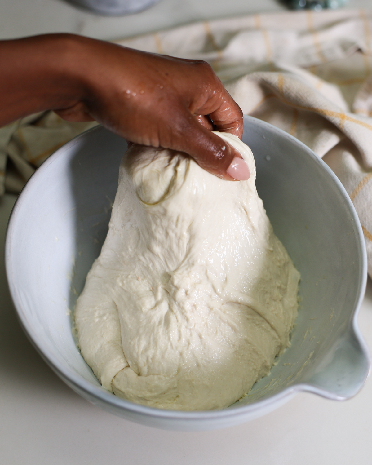 stretching dough to fold