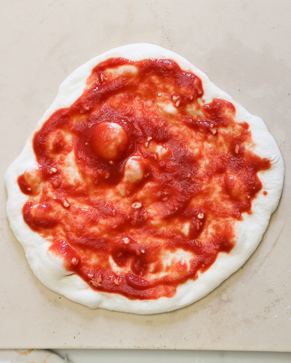 overhead sauce on pizza