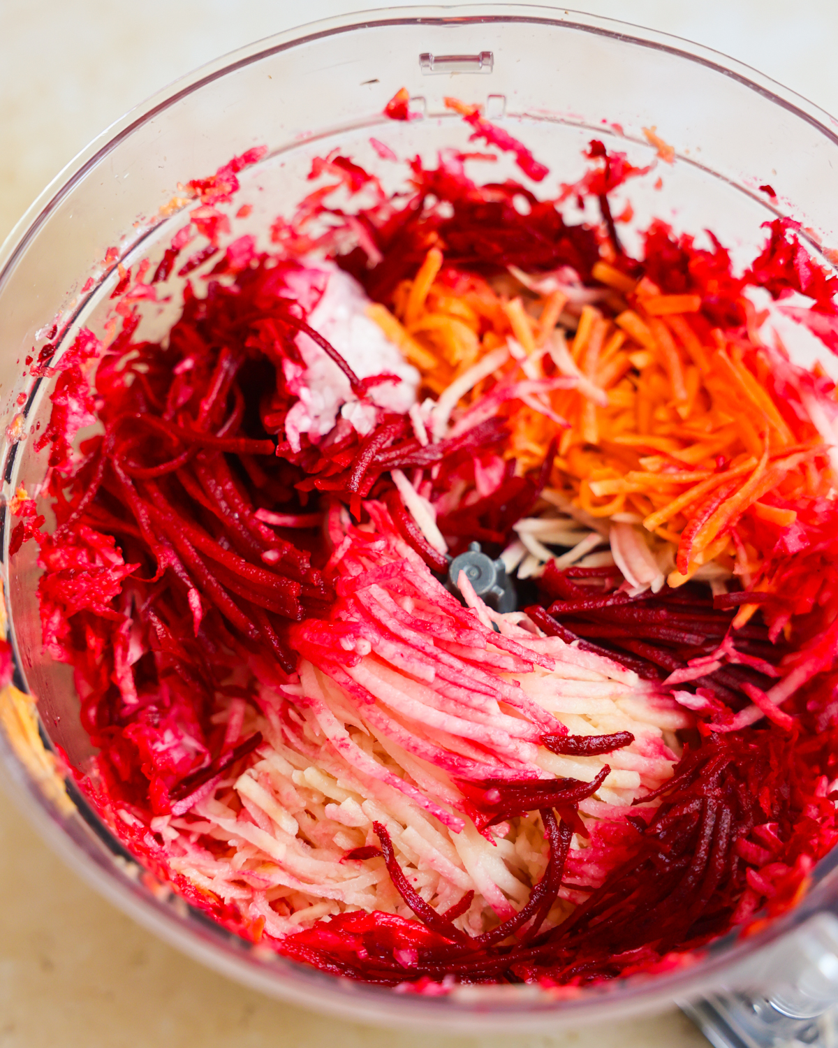 grated veggies in food processor