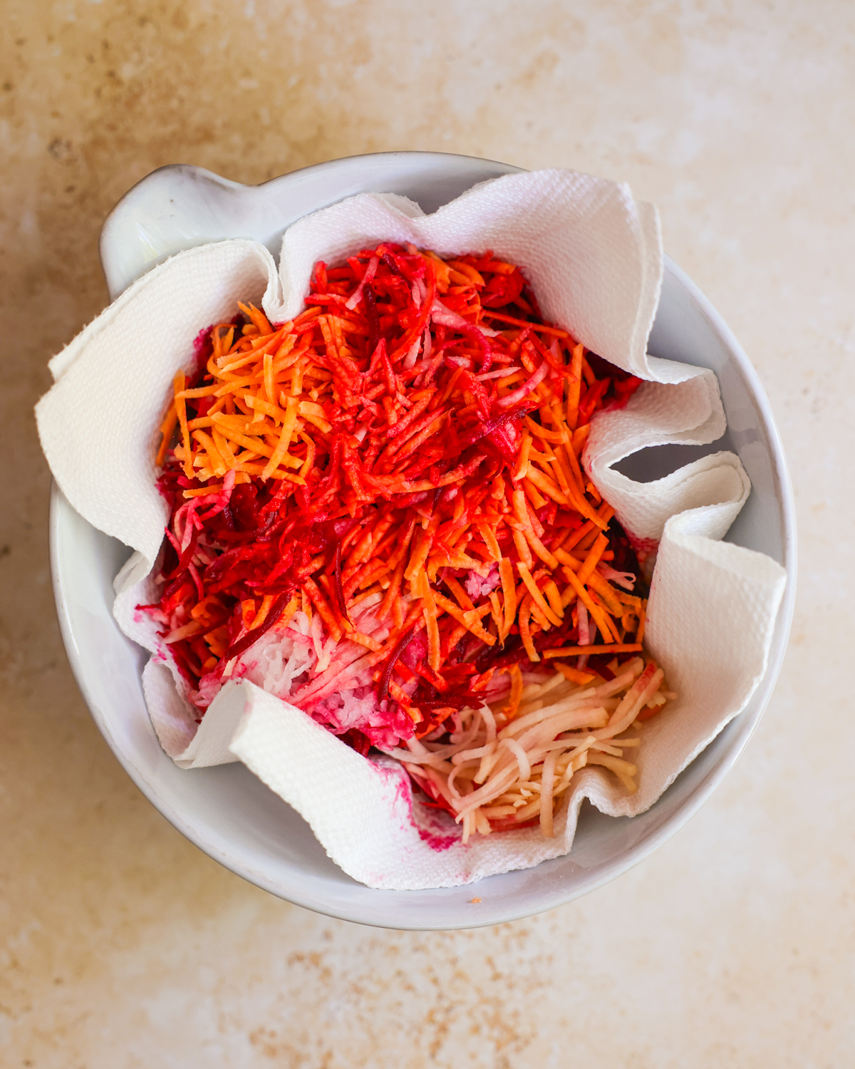 shredded veggies in paper towel
