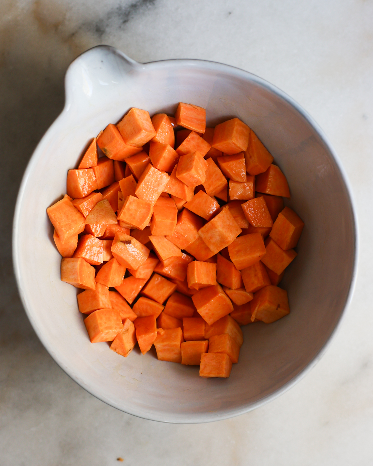 overhead sweet potato cubes in a bowl