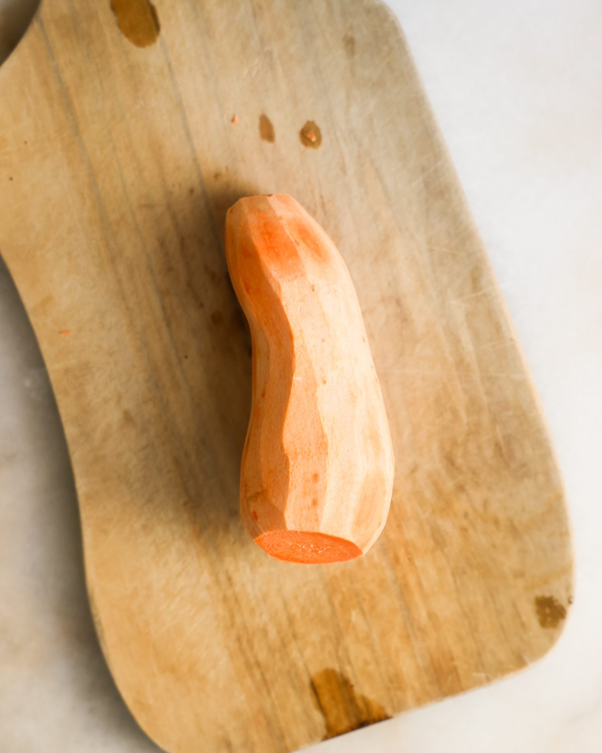 sweet potato on a cutting board